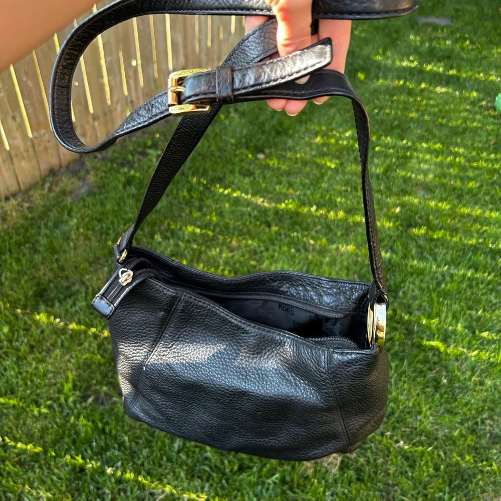 Black leather crossbody by Michael Kors.